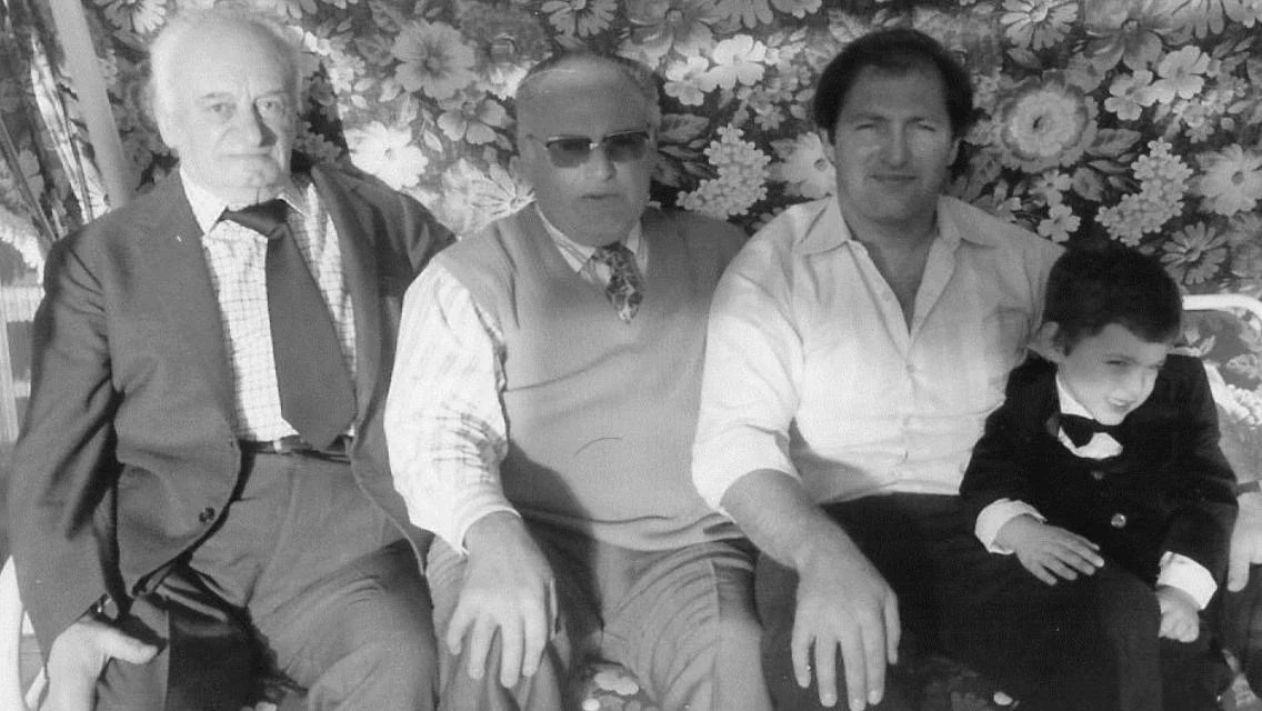 Four generations of Morelli men together — Mario, Giuseppe, Marino and a young Nito